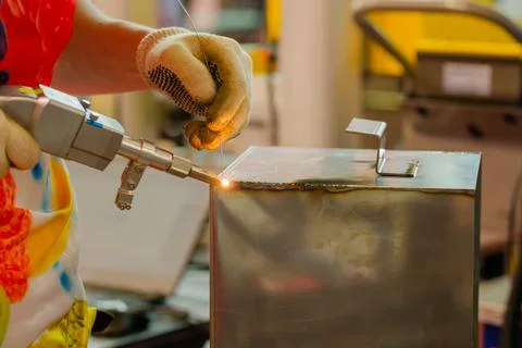 close welder hands using handheld photo 233180777 iconl nowm